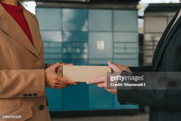 People Holding Box 34,542 Two People Holding Box Stock Photos, High-Res Pictures, and ...