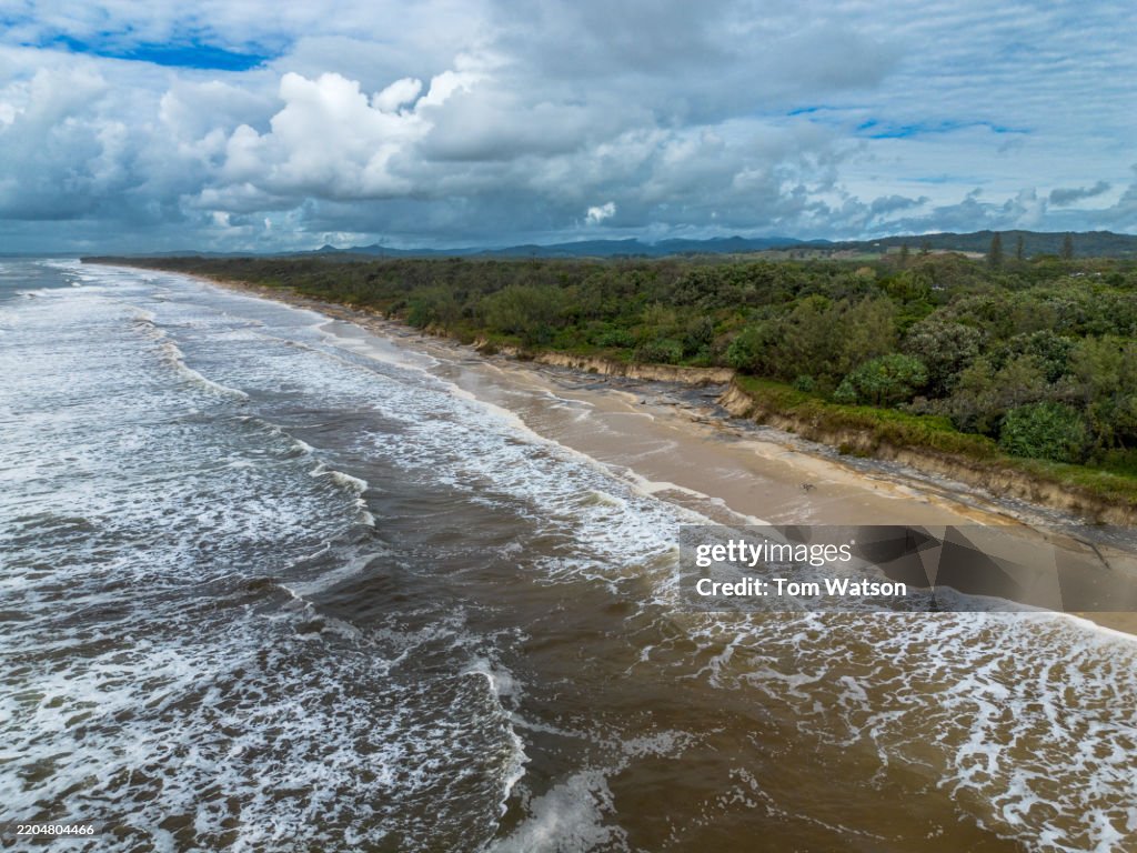 Coastal erosion in Pottsville, New South Wales after Cyclone Alfred storm impacts beach landscape