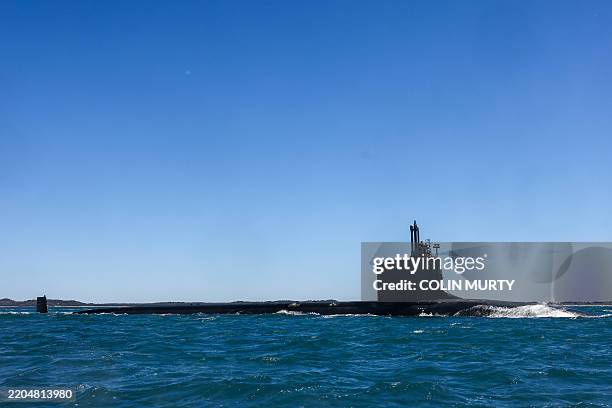 The US Navy's USS Minnesota , a Virginia-class fast attack submarine, sails in waters off the coast of Western Australia on March 16, 2025.