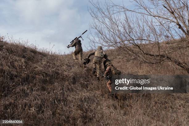 Sniper platoon of the 42nd Separate Mechanized Brigade practices shooting at an outdoor firing range before combat missions in the Vovchansk...