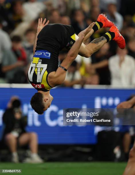 Seth Campbell of the Tigers celebrates after scoring a goal during the round one AFL match between Richmond Tigers and Carlton Blues at Melbourne...