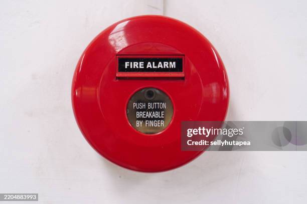 red fire alarm on wall - fire prevention stock pictures, royalty-free photos & images