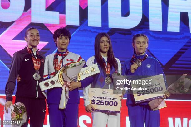 Busenaz Cakiroglu of Turkiye wins the silver medal in the 52 kg category, losing to Pang Chol Mi of North Korea at the final match of the IBA Women's...