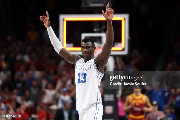 Keba Keita of the Brigham Young Cougars reacts as the Cougars defeat the Iowa State Cyclones 96-92 to win the quarterfinal game of the Big 12 men's...