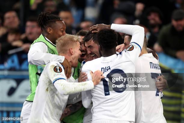 Alessio Romagnoli of Lazio celebrates scoring his team's first goal with teammates during the UEFA Europa League 2024/25 Round of 16 Second Leg match...