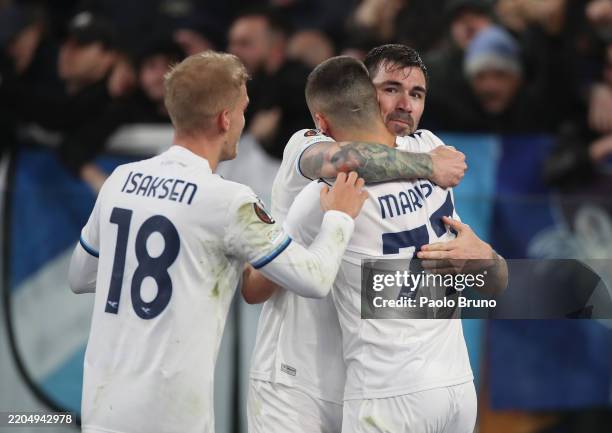 Alessio Romagnoli of Lazio celebrates scoring his team's first goal with teammates Adam Marusic and Gustav Isaksen during the UEFA Europa League...