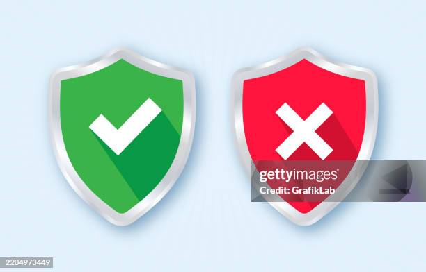 stockillustraties, clipart, cartoons en iconen met green and red shield icons with checkmark cross symbols - illustrator