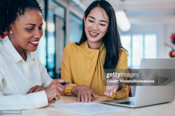 business people signing a contract in the office. - form filling stock pictures, royalty-free photos & images