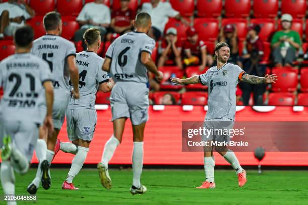 Luke Brattan of Macarthur FC celebrates after scoring his teams fifth goal during the round 23 A-League Men match between Adelaide United and...