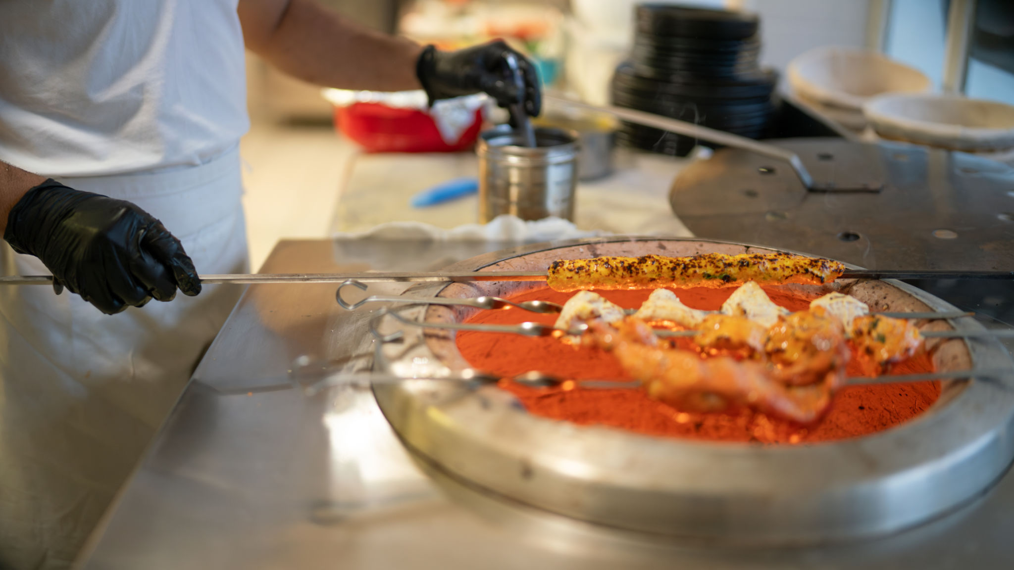 chef preparing skewers