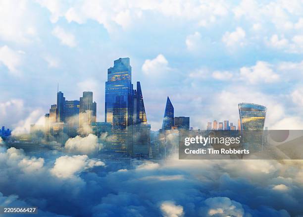 the city of london financial district covered in clouds at sunset - anywhere but here stock pictures, royalty-free photos & images