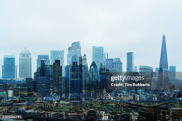 view of multiple london buildings - città diffusa foto e immagini stock