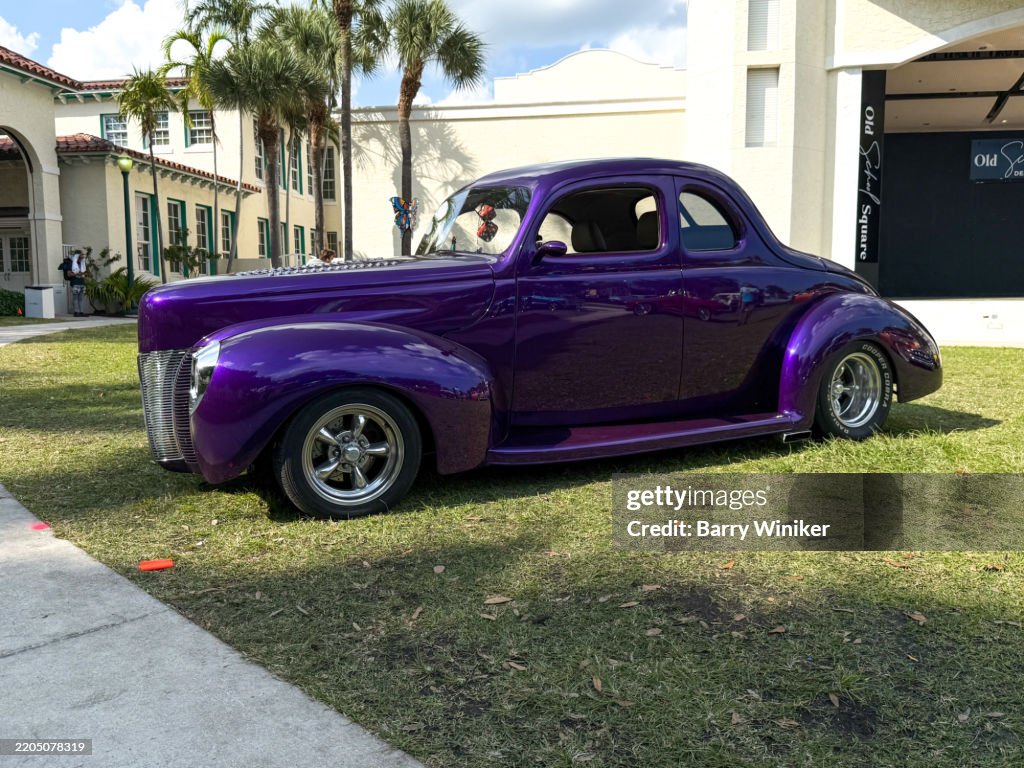 1940 Ford Coupe in purple at car show