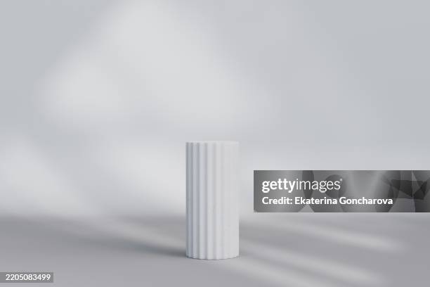 minimalist column design in neutral light gray surroundings - pedestal stock pictures, royalty-free photos & images