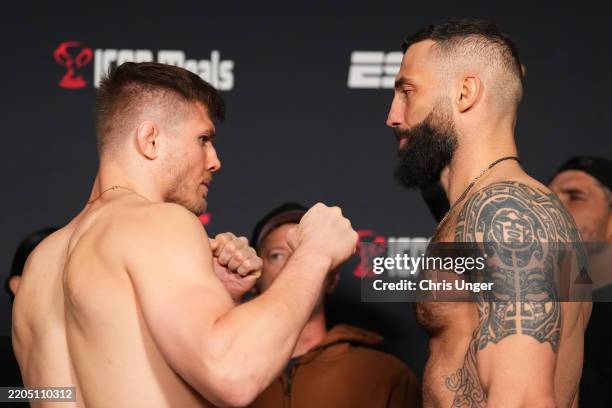 Opponents Marvin Vettori of Italy and Roman Dolidze of Georgia face off during the UFC Fight Night weigh-in at the Palace Station Hotel & Casino on...