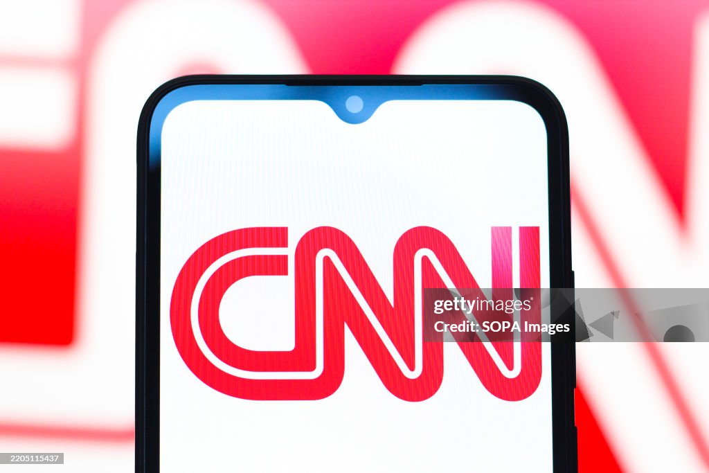 Cnn Photo In this photo illustration, the CNN logo is seen displayed on a... News ...