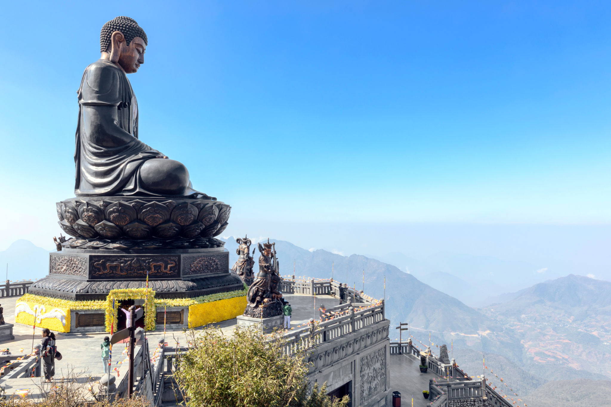 Big buddha statue at the top of Fansipan mountain Big buddha statue at the top of Fansipan mountain