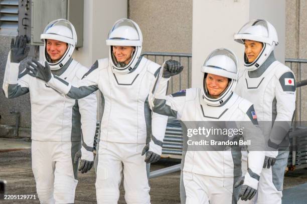 Astronauts commander Anne McClain and pilot Nichole Ayers, alongside mission specialists, JAXA astronaut Takuya Onishi and Roscosmos cosmonaut Kirill...