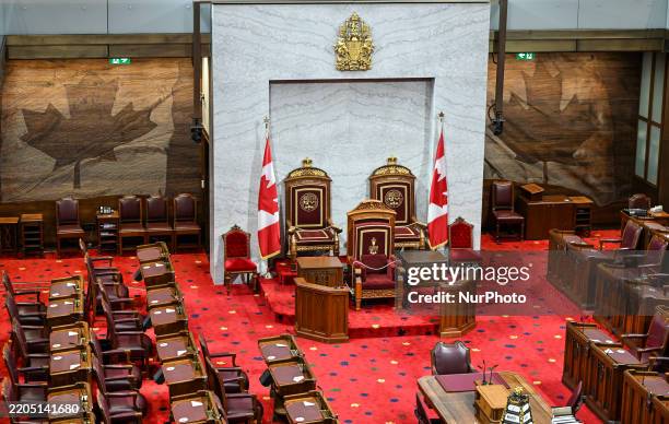 The speaker's dais, showcasing the new royal thrones crafted from English walnut sourced from Windsor Great Park, is displayed inside the temporary...