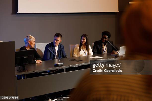 business panel discussion at conference - control panel stock pictures, royalty-free photos & images