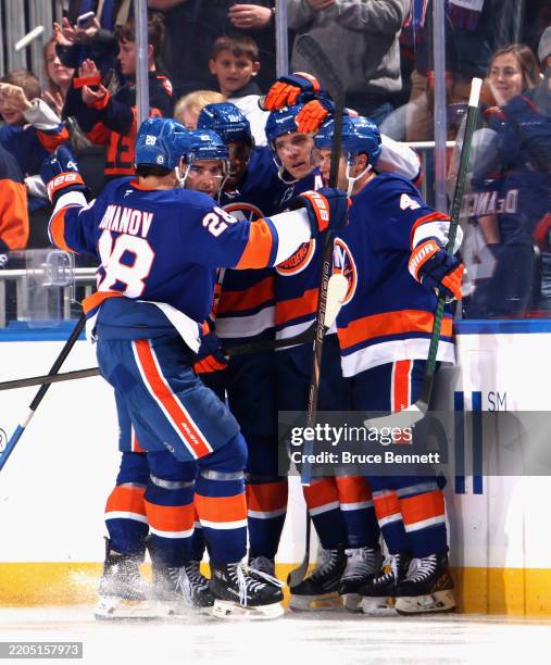 Bo Horvat of the New York Islanders celebrates his third period goal against the Edmonton Oilers at UBS Arena on March 14, 2025 in Elmont, New York.