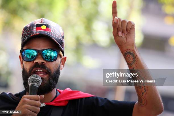 Activist Paul Silva speaks during a rally calling for the improved treatment and rights of Indigenous Australians at Town Hall on March 15, 2025 in...