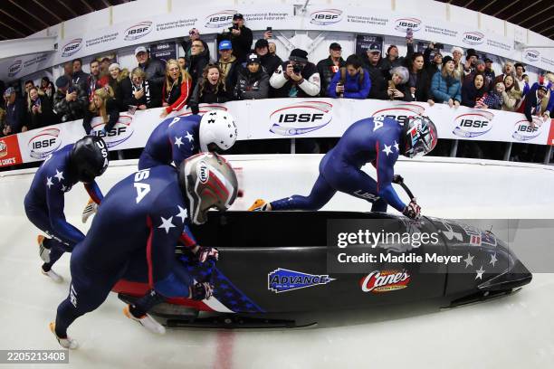 Kristopher Horn, Carsten Vissering, Martin Christofferson and Hunter Powell of the United States compete in heat 3 of the 4-man-bobsleigh on day six...