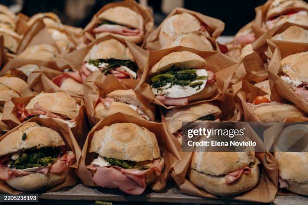 takeaway sandwich bun with mozzarella cheese, spinach and tomatoes, with italian sausage mortadella - mortadella stock pictures, royalty-free photos & images