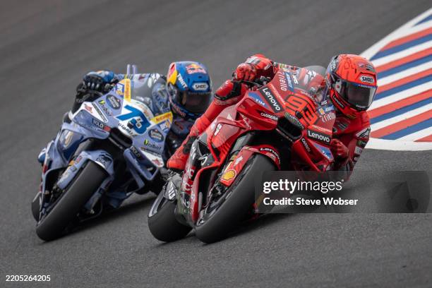 Marc Marquez of Spain and Ducati Lenovo Team rides in front of Alex Marquez of Spain and Gresini Racing MotoGP™ during the Sprint Race of the MotoGP...
