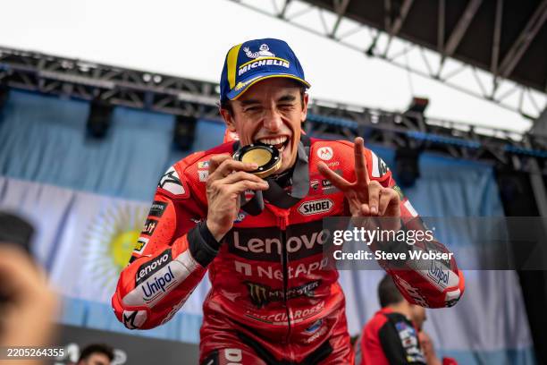 Marc Marquez of Spain and Ducati Lenovo Team with his race winning medal on the podium during the Sprint Race of the MotoGP Gran Premio YPF Energía...