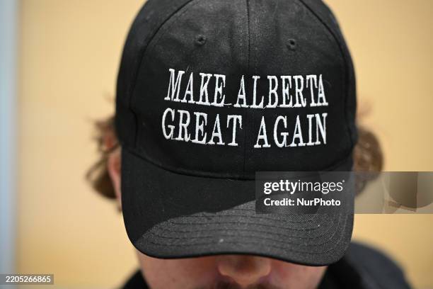 Member of the public wears the 'Make Alberta Great Again' hat during the event Help Us Make Sovereignty for Alberta Happen, organized by the Alberta...