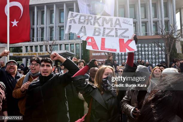 University students gather in front of the municipality headquarters in support of arrested Istanbul Mayor Ekrem Imamoglu on March 19, 2025 in...