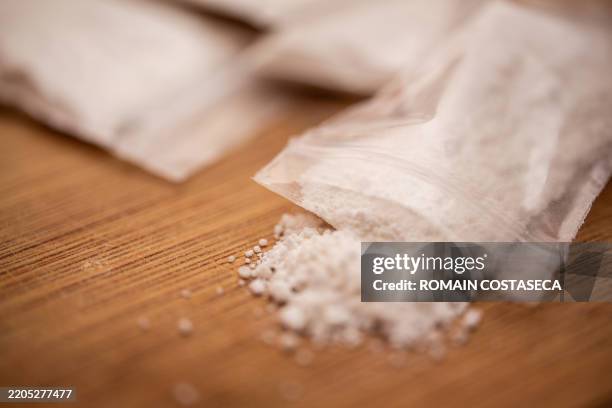 Fake cocaine in a transparent bag on a board illustrating drug trafficking in Clermont Ferrand France on March 19 2020.