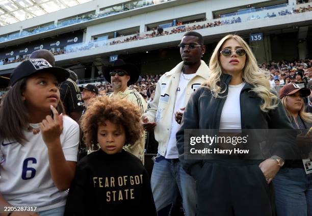 Paul Pogba and family on the sidelines during a 1-0 Austin FC win over the Los Angeles FC at BMO Stadium on March 15, 2025 in Los Angeles, California.