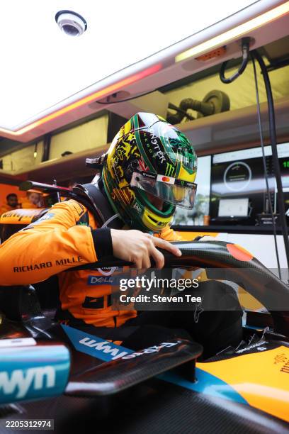 Oscar Piastri of Australia and McLaren prepares to drive in the garage prior to the F1 Grand Prix of Australia at Albert Park Grand Prix Circuit on...