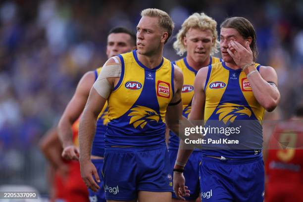 Oscar Allen and Harley Reid of the Eagles walk from the field at the half time break during the round one AFL match between West Coast Eagles and...