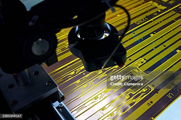 scanning & examining semiconductor circuit board - china technology manufacturing production stock pictures, royalty-free photos & images