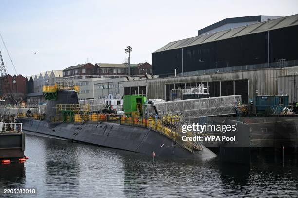 The HMS Agamemnon nuclear submarine is seen docked at the BAE systems factory on March 20, 2025 in Barrow-in-Furness, United Kingdom. The UK's...