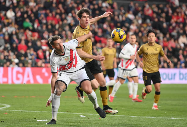 Florian Lejeune of Rayo Vallecano battles for possession against Aritz Elustondo of Real Sociedad during the LaLiga match between Rayo Vallecano and...