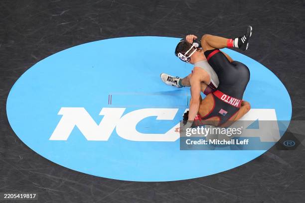 Christoper Minto of the Nebraska Cornhuskers wrestles Joseph Bianchi of the Little Rock Trojans during the 2025 NCAA Division I Men's Wrestling...