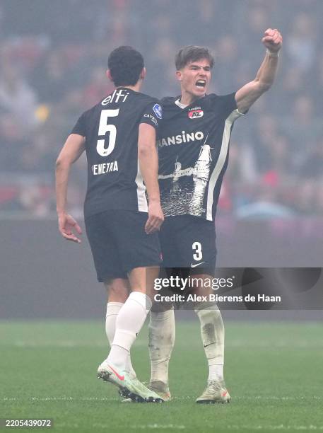 Wouter Goes and Alexandre Penetra of AZ Alkmaar react after Zico Buurmeester of AZ Alkmaar scored his teams first goal in the second half of the...