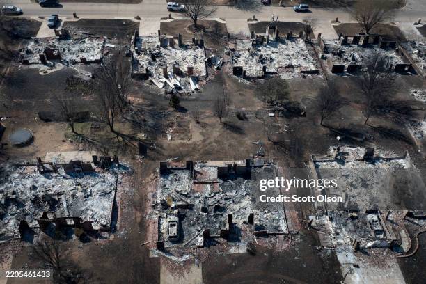 An aerial view of homes destroyed by Friday's wildfire on March 16, 2025 in Stillwater, Oklahoma. Governor. Kevin Stitt said that the wildfires...