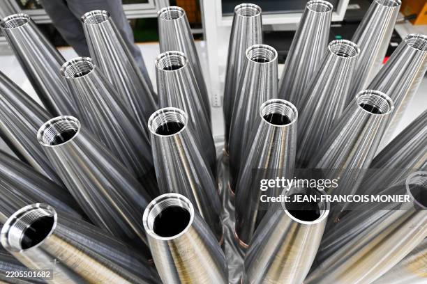 This photograph shows 155 millimeter caliber shells displayed during a visit at the site of the KNDS factory which delivers medium caliber munitions...
