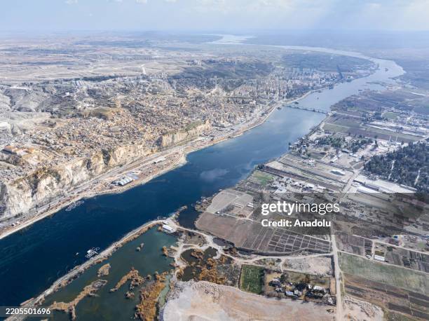 An aerial view of Euphrates River, a major river in Western Asia that flows through Turkiye, Syria, and Iraq, in Saray Neighborhood of Nizip District...
