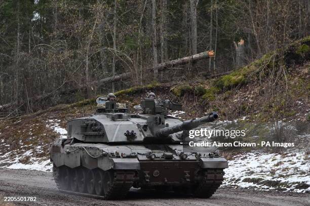 The Prince of Wales , Colonel-in-Chief, Mercian Regiment in a Challenger 2 tank during his visit to the training area at Tapa Camp, to hear how the...