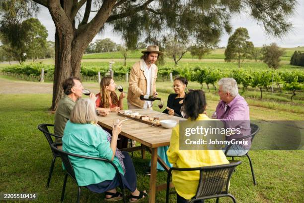 hunter valley wine tasting event continuing outdoors - hunter valley stock pictures, royalty-free photos & images