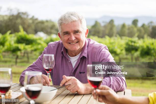 vineyard portrait of cheerful senior male wine taster - pokolbin stock pictures, royalty-free photos & images
