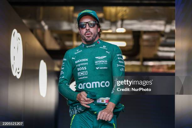 Fernando Alonso of Spain and the Aston Martin Aramco F1 Team appears in the FIA garage during Sprint Qualifying ahead of the F1 Grand Prix of China...