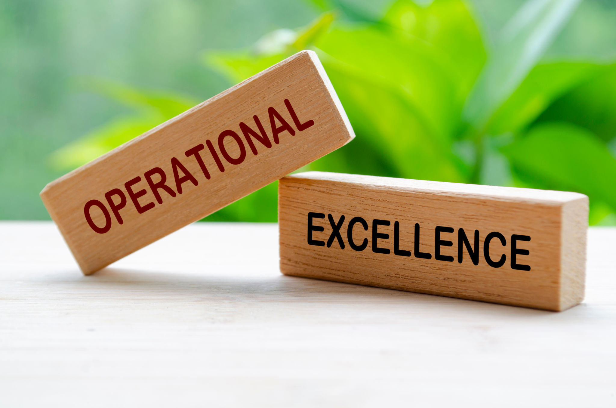 Operational Excellence text on wooden blocks. Continuous Improvement concept Operational Excellence text on wooden blocks. Continuous Improvement concept
