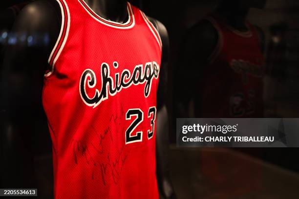 Michael Jordan's Chicago Bulls 1984-1985 game-worn and signed 'Preseason Debut' rookie jersey is on display during a public exhibition at Sotheby's...